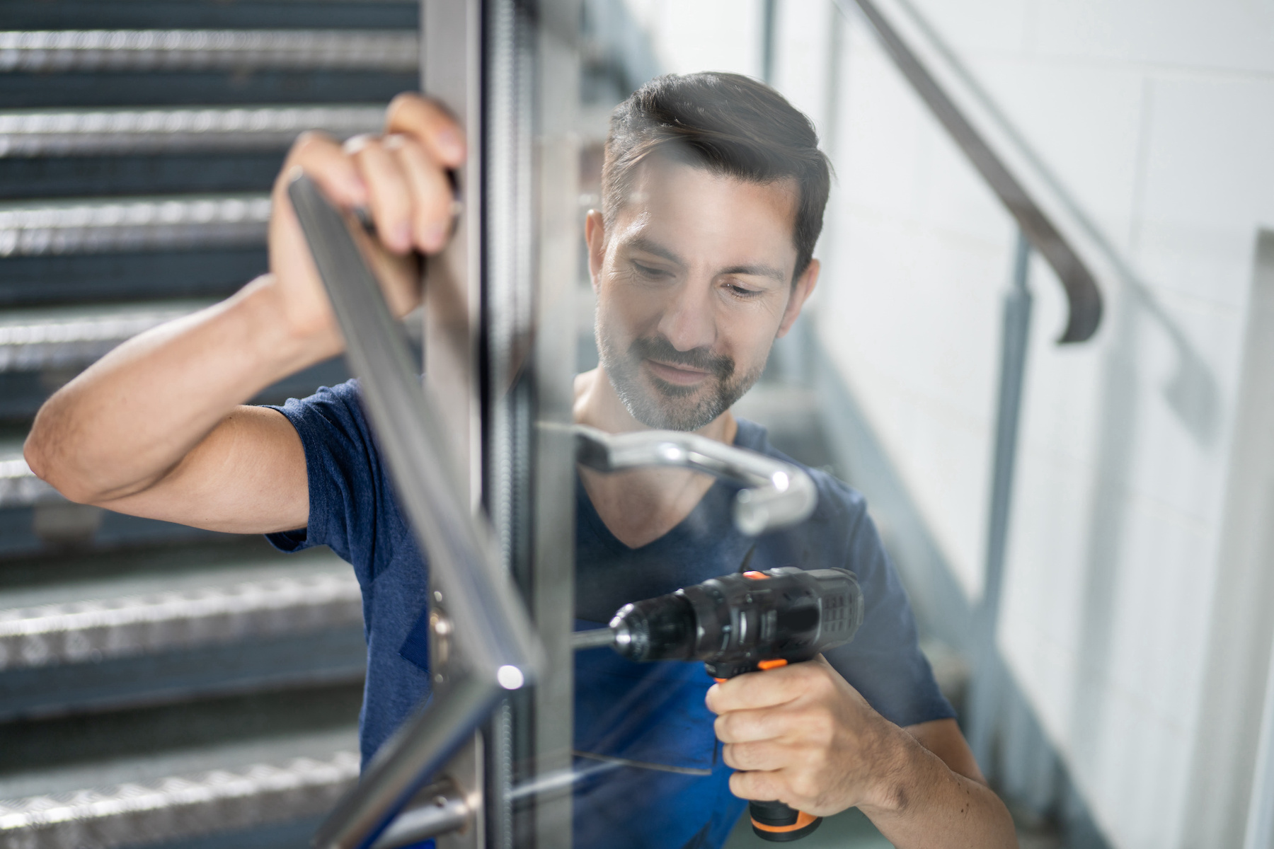 Handyman Fitting A New Door